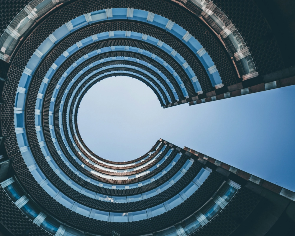 building from below looking like C building from below looking like C