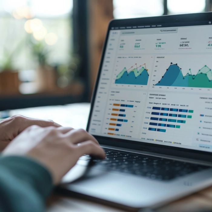 person doing data analysis on laptop for built environment business person doing data analysis on laptop for built environment business