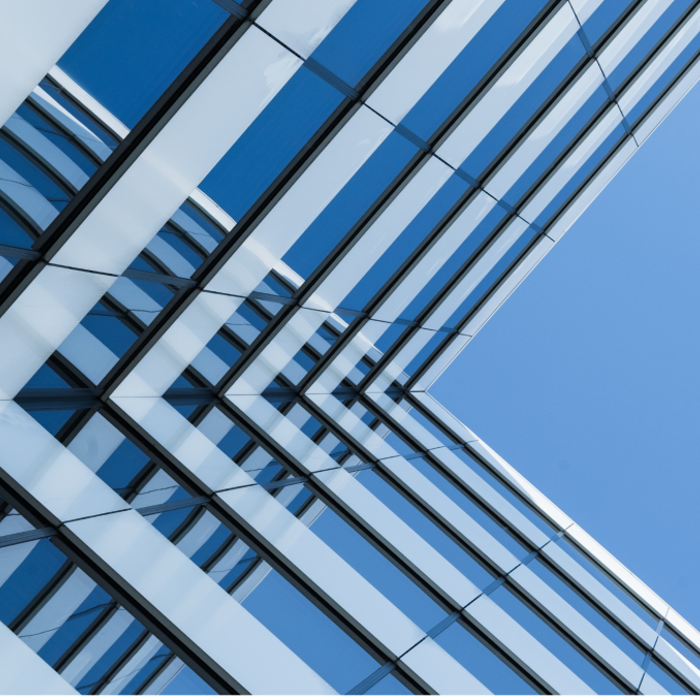 Glass skyscraper and blue sky Glass skyscraper and blue sky